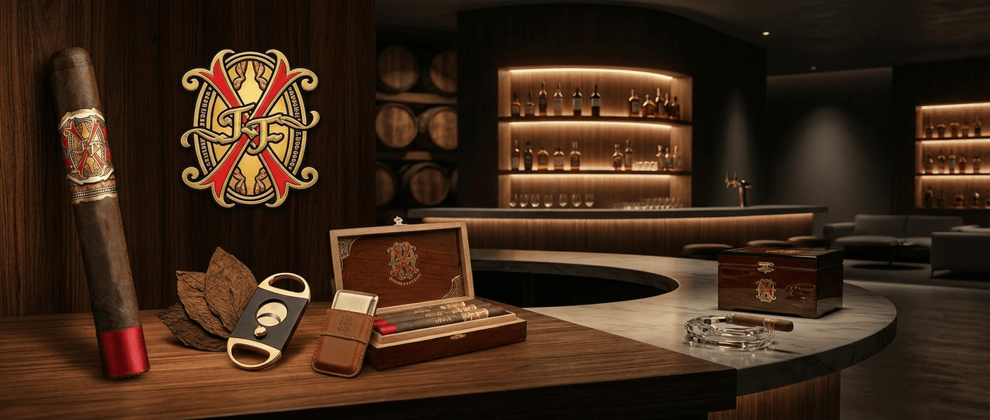 Arturo Fuenter Home Page Banner.  Large Opus X CRobusto Cigar on the Table with an open Box of OpusX and Closed Box.